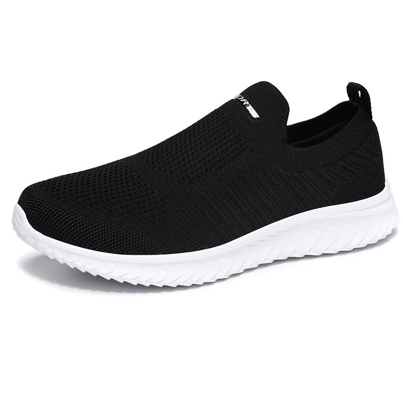 Ultralätta komfort sneakers i svart/vitt – unisex slip-on sko från Amstedt Co
