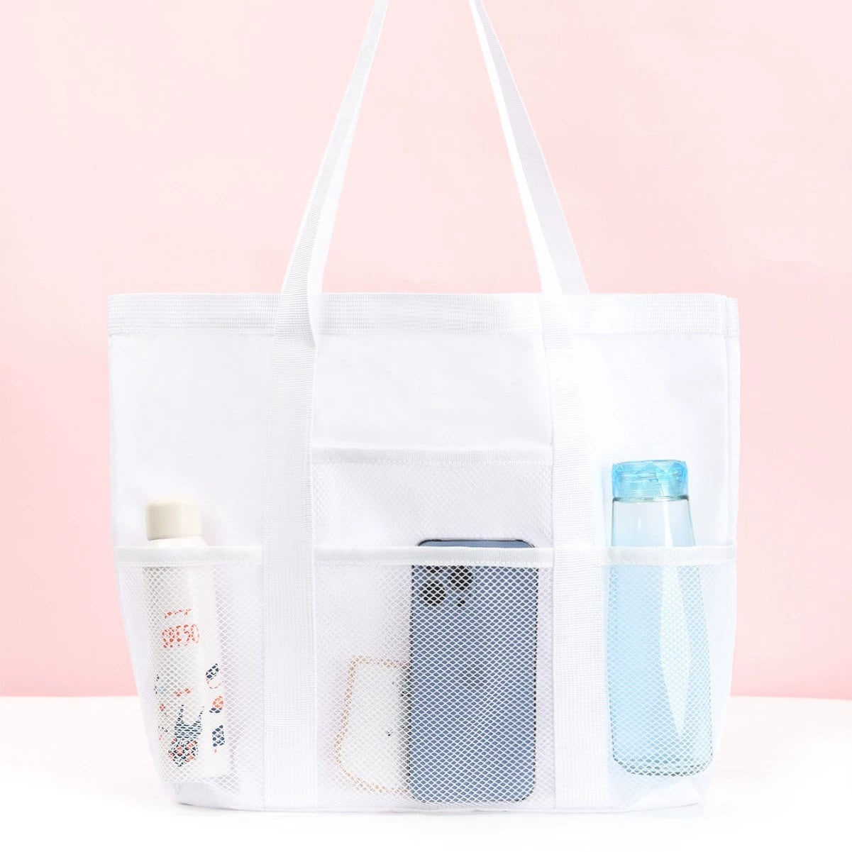 Beach tote bag unisex in white, spacious for beach essentials like towels and sunscreen.
